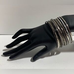 Group of silver bangle bracelets